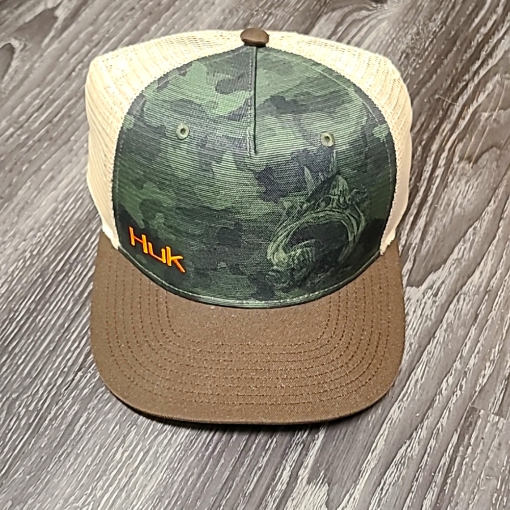 Huk Size L/XL adjustable Hat. Brown bill with Green Camo Front. Never worn.